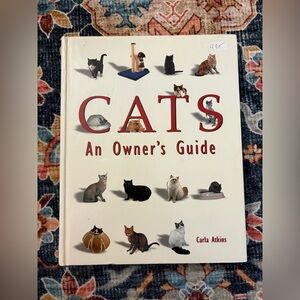 Cats: An Owner's Guide by Carla Atkins - Cream Cover